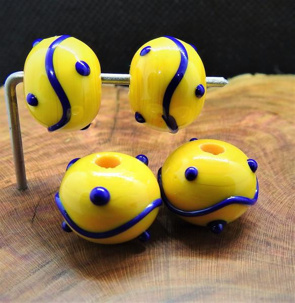 yellow with blue glass bead