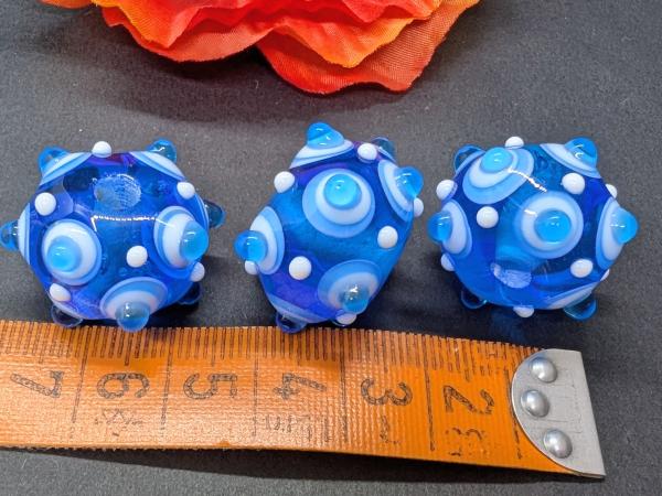 Augenperle türkis weiß