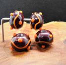 rotbraun mit orange Glasperle